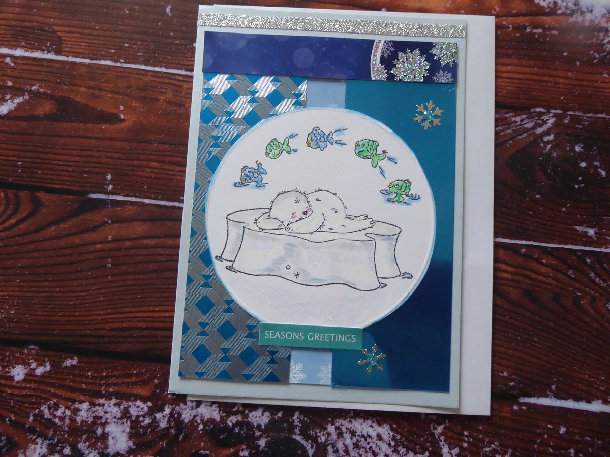 Cute Christmas Card with a baby seal image